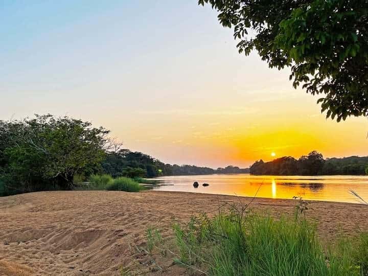 Sunset over the river at Tiwai Island, Sierra Leone