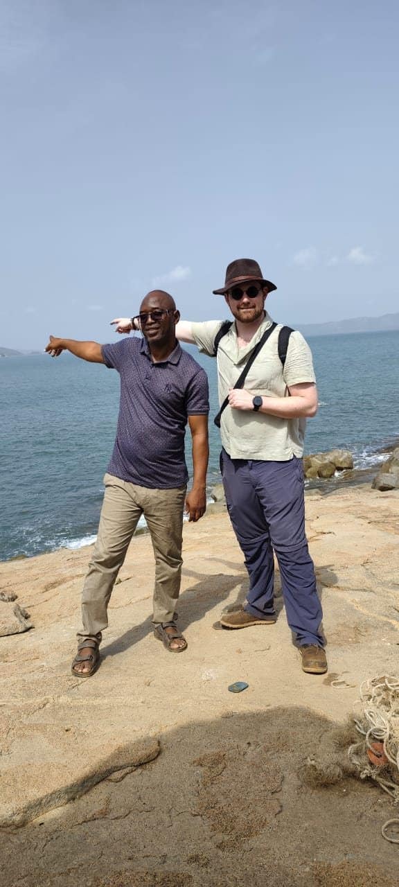 Guide and guest on the rocky Atlantic coast