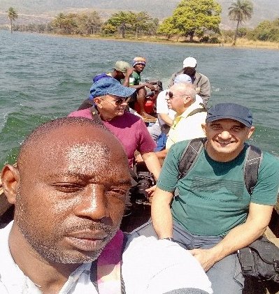 Travellers on a boat trip on Lake Samaya, Guinea